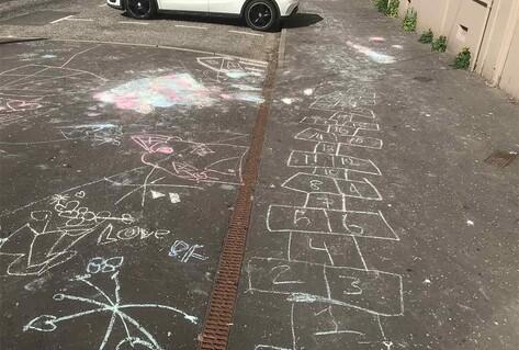 children&#039;s chalk drawings on ground for playing